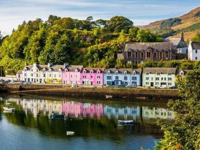 The Isle of Skye is famous for its natural beauty and the village of Portree, the capital of the island, is no exception. Originally a fishing village, Portree is surrounded by rolling hills and overlooks a beautiful loch.
