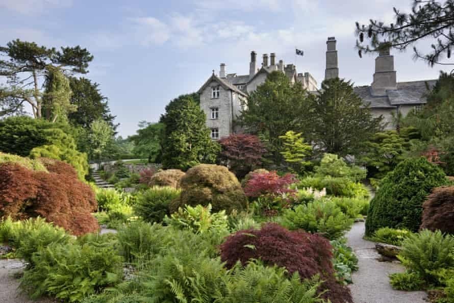 Sizergh Castle, near Kendal, Cumbria. The Rock garden covers almost an acre and is closely planted with dwarf conifers, Japanese maples and hardy ferns.