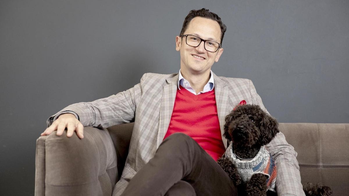 Michael Teixeira of MVF uses ‘puppy therapy’ to boost wellbeing for colleagues