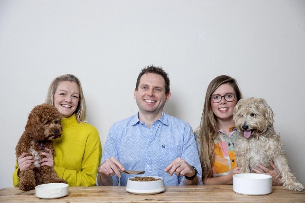 James Davidson and dog-loving colleagues at Tails.com